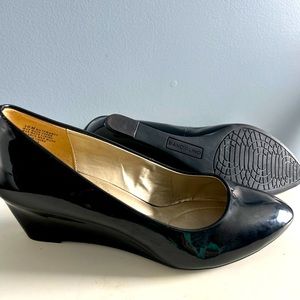 Bandolino patent leather ladies, wedge heel size 10. Gently used.